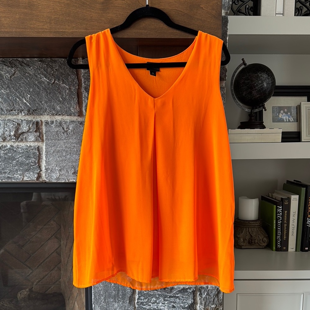Orange Sleeveless Top new without tags. Classy drape tank top blouse.